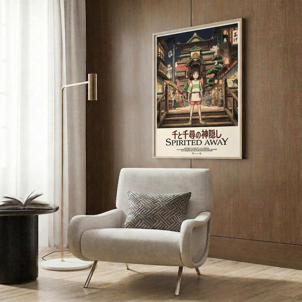May include: Spirited Away movie poster mockup in modern living room setting. Framed poster shows young girl character standing in colorful Japanese village scene with traditional buildings at night. Poster hangs on wood-paneled wall above beige upholstered armchair with geometric patterned pillow. Gold floor lamp and small round table with open book nearby. Warm neutral tones throughout room with natural lighting from window.