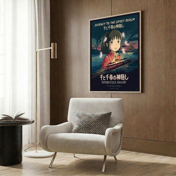 May include: Framed Spirited Away movie poster mounted on wood-paneled wall above beige upholstered armchair with geometric pillow. Poster features anime girl character with dark hair in red outfit against twilight sky with train and spirits. Modern living room setting with gold floor lamp and side table with open book.
