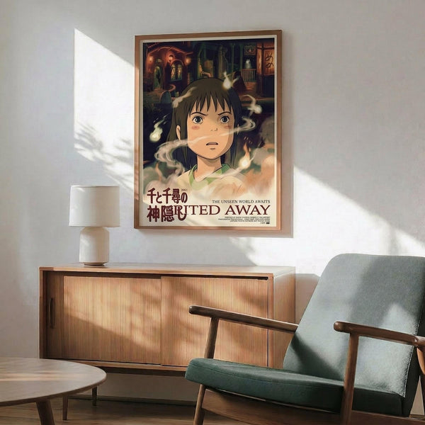 May include: Framed Spirited Away movie poster featuring Chihiro, a young girl with dark hair surrounded by white spirits, displayed above a wooden sideboard with ceramic lamp in a modern living room with teal upholstered chair and natural lighting creating geometric shadows on white walls.