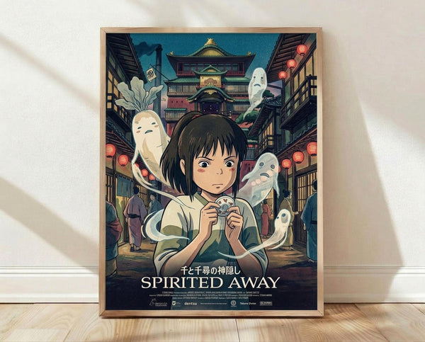 May include: Framed Spirited Away movie poster leaning against white wall on wooden floor. Features young girl with dark hair holding small object, surrounded by white spirits in traditional Japanese bathhouse setting with red lanterns. Colorful anime artwork in natural wood frame with soft shadows from window light.