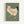 Framed vintage Japanese woodblock print of a white hen with red comb and black tail feathers walking against a muted green background. The artwork shows detailed line work and natural coloring in traditional Asian art style, displayed in a light wood frame on a white wall.