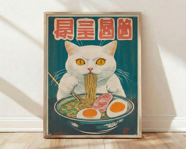 May include: Framed poster print featuring a white cat with golden eyes eating ramen noodles from a dark bowl. The cat holds chopsticks with noodles streaming from its mouth. Red Japanese characters appear at the top against a teal background. The bowl contains eggs, meat, and greens. Vintage-style artwork in wood frame, displayed on light wooden floor against white wall with soft lighting creating diagonal shadows.