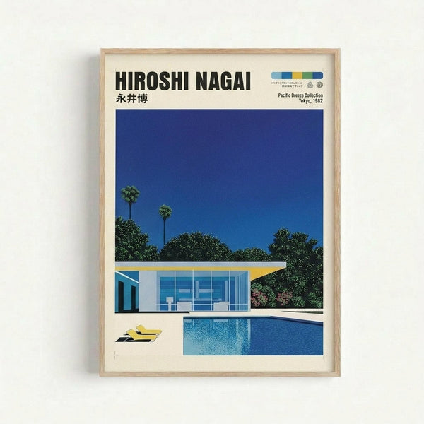 Framed poster print featuring a minimalist illustration of a modern white house with large glass windows beside a bright blue swimming pool. Two tall palm trees rise behind the building against a deep blue sky. Yellow pool floats sit on the white deck area. The artwork uses clean geometric shapes and bold colors in a mid-century modern style. Text at top reads "HIROSHI NAGAI" with Japanese characters and "Pacific Breeze Collection Tokyo, 1982" in the upper right corner. Light wood frame