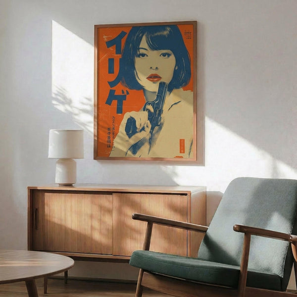 May include: Framed vintage-style poster featuring woman with black bob haircut holding gun against orange background with Japanese text, displayed above wooden sideboard with white ceramic lamp, next to sage green mid-century armchair in bright sunlit room with white walls