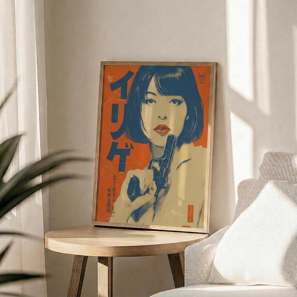 May include: Framed vintage-style Japanese poster featuring a woman with black bob haircut holding a gun, rendered in orange and blue tones with Japanese text, displayed on a round wooden side table next to a beige upholstered chair with decorative pillow and plant leaves visible in soft natural lighting