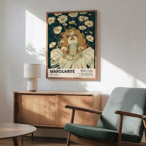 May include: Art Nouveau style poster featuring woman with curly reddish hair surrounded by white daisies against dark teal background, displayed in thin wooden frame above mid-century modern walnut credenza with white ceramic lamp, next to sage green upholstered armchair with wooden arms in sunlit room with white walls