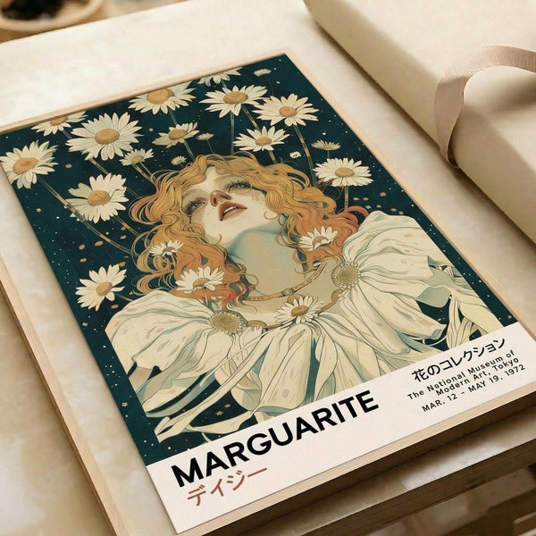 May include: Vintage-style art poster featuring a woman with curly golden hair surrounded by white daisies against a dark teal starry background, displayed in a light wooden frame on white wrapping paper with cream ribbon nearby. The poster has Japanese text and "MARGUERITE" at the bottom with exhibition dates from 1972.