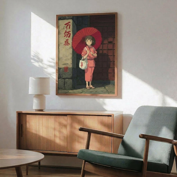 May include: Framed anime-style poster showing young girl in red kimono holding red parasol and white bag, standing by traditional Japanese building with wooden doors and stone walls. Displayed above wooden sideboard with table lamp in modern living room with gray upholstered chair and round coffee table.