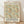 May include: Framed poster with ornate floral pattern in sage green, coral red, and cream colors featuring William Morris-style botanical design. Text reads "Cotton Prints Exhibition" and "South Kensington" with exhibition details. Light wood frame displayed against white wall on wooden floor with soft natural lighting creating shadows.