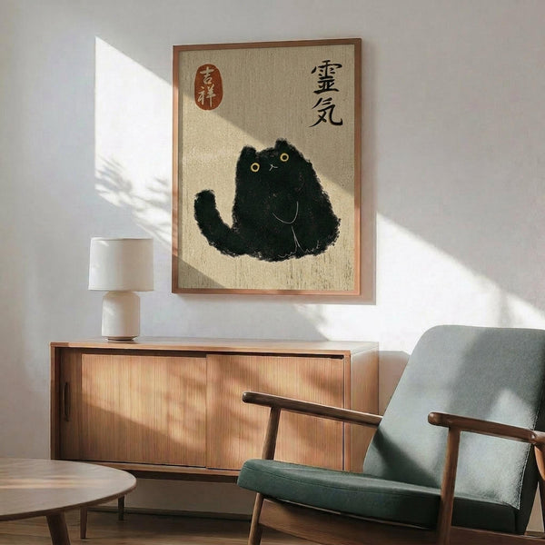 May include: Framed artwork showing a black cat illustration with Japanese characters and red stamp seal, displayed above a wooden sideboard with white table lamp in a mid-century modern living room setting with mint green upholstered chair and round coffee table, all bathed in natural sunlight creating geometric shadows on white walls.