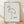 May include: Framed minimalist line drawing of a flamingo in black ink on white paper, displayed in light wood frame against white textured wall with natural lighting and shadows, positioned on light wooden floor