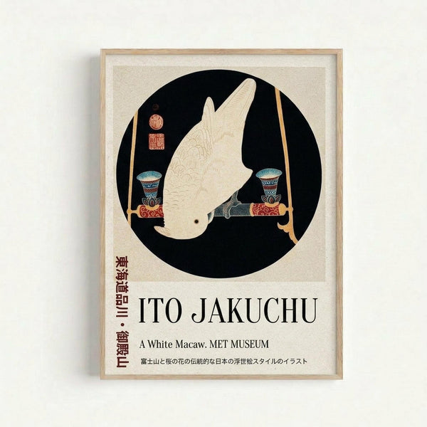 A framed museum poster featuring a white cockatoo in profile within a black circle, accompanied by decorative ornamental vessels and red Japanese seals. The bird is rendered in a traditional Japanese art style with fine line details. Below the circular composition is text reading "ITO JAKUCHU" and "A White Macaw. MET MUSEUM" along with Japanese characters. The poster has a cream background and is displayed in a light wood frame against a white wall.