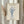 May include: Framed botanical wall art showing blue line drawing of dried flowers in a glass vase on cream background, displayed on neutral wall beside dried pampas grass stems in soft natural lighting