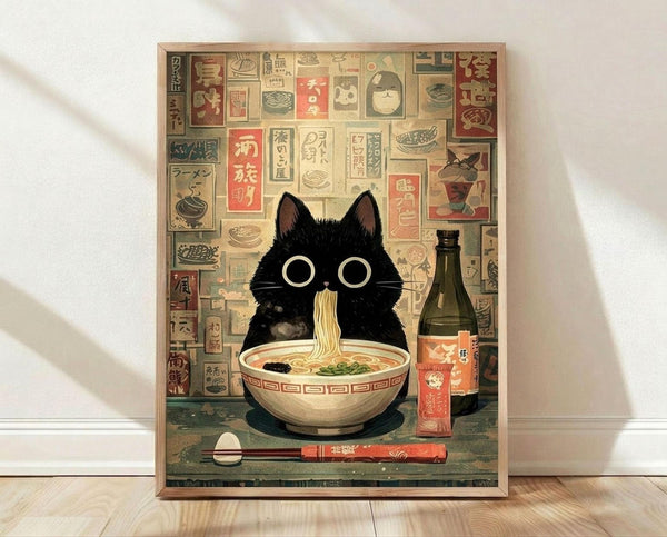 May include: A framed poster print displayed on wooden flooring against a white wall. The artwork features a black cat with large round white eyes sitting behind a bowl of ramen noodles, with chopsticks and a bottle nearby. The background shows a collage of vintage Japanese food advertisements and signs in muted colors including red, beige, and green. The print appears in a natural wood frame and casts soft shadows on the wall.