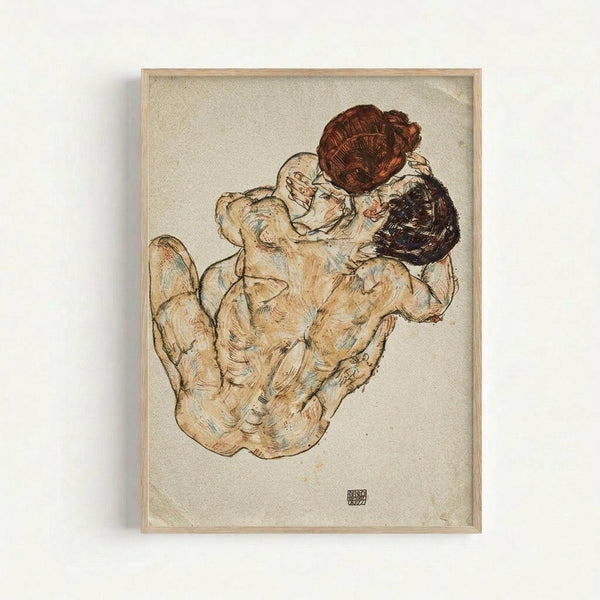 Framed reproduction of an early 20th century expressionist drawing showing two embracing nude figures rendered in muted earth tones with reddish-brown and dark hair. The artwork features loose, sketchy linework with watercolor washes in beige, brown and pale blue tones on aged paper background. A small monogram appears at bottom. The print is displayed in a light wood frame against a white wall.
