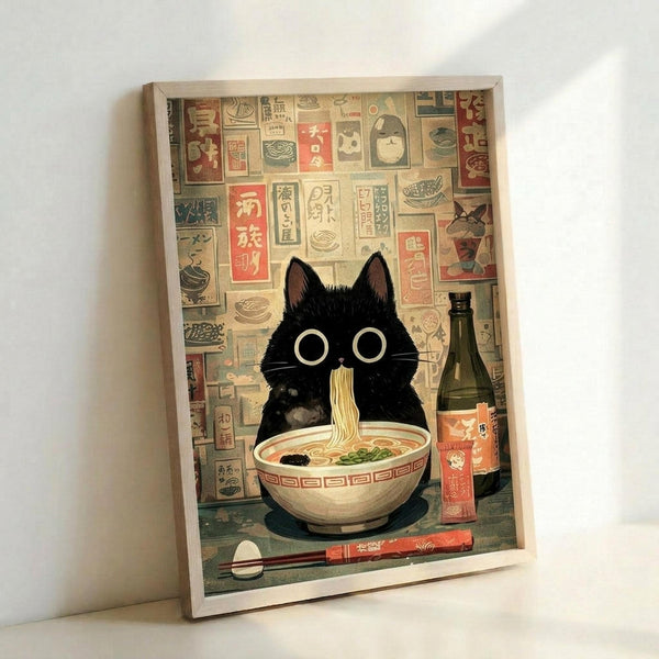 May include: Framed poster print leaning against white wall showing adorable black cat with large round eyes sitting behind bowl of ramen noodles with chopsticks. Background features collage of vintage Japanese restaurant signs and text in muted colors. Light wood frame, cozy kawaii art style with warm beige and red tones throughout the illustrated design.