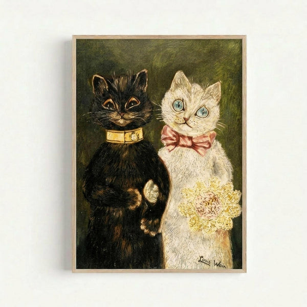 Framed vintage-style illustration of two anthropomorphic cats dressed for a wedding. The groom is a black cat with golden eyes wearing a yellow collar, while the bride is a white cat with blue eyes wearing a pink bow tie and holding yellow flowers. Both cats are depicted in Louis Wain's characteristic whimsical style against a muted green background. The artwork is displayed in a simple wooden frame on a white wall.