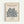 May include: Framed art print with cream background displaying abstract blue botanical cutout shapes in Henri Matisse's signature style, featuring text "MATISSE HAMMER MUSEUM" at top and "LA GERBE" with "Henri Matisse, 1953" at bottom, mounted in light wood frame against white wall