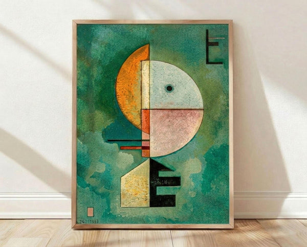 May include: Abstract modernist artwork in light wood frame leaning against white wall on wooden floor. Green textured background with geometric shapes including orange crescent, white and pink semicircle with small dark dot, yellow angular form, and black rectangular elements. Composition features overlapping circular and linear forms in earth tones with painterly, vintage appearance.
