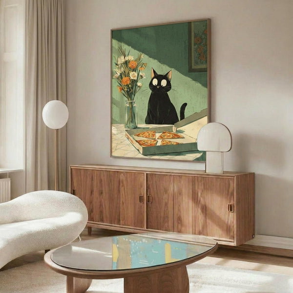 May include: Framed artwork showing a black cat with white eyes sitting beside a vase of orange and white flowers and an open pizza box on a table. The illustration features green walls and warm lighting. Displayed above a wooden sideboard with sliding doors in a modern living room with white curved chair, oval glass coffee table, and beige curtains.