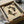 May include: Framed poster print featuring two black koi fish in yin yang formation on aged beige background with red Chinese characters and "LOSE YOUR MIND, FIND YOUR SOUL" text below. Black frame in opened cardboard shipping box with white tissue paper padding on wooden surface.