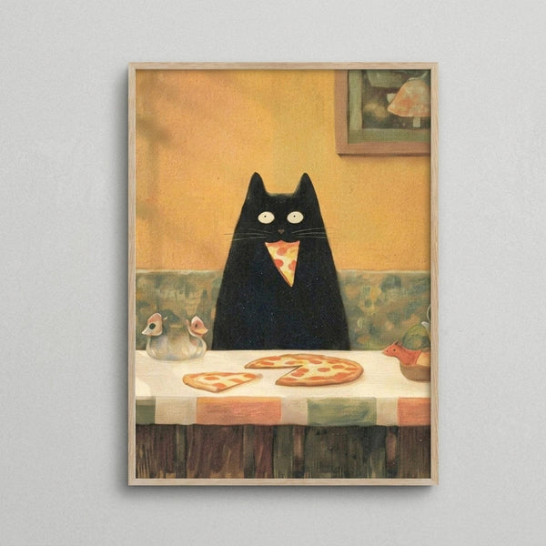 May include: Framed artwork showing a black cat with white eyes sitting at a checkered tablecloth table, eating a slice of pizza. The cat appears silhouetted against warm yellow walls with a small framed picture visible in the background. Salt and pepper shakers sit on the table alongside whole pizza. The print has a cozy, whimsical illustration style in a light wood frame mounted on a white wall.