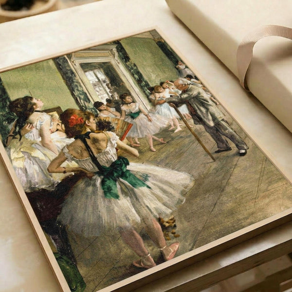 May include: Impressionist painting reproduction showing ballet dancers in white tutus with green sashes practicing in an ornate dance studio. The artwork features soft pastels and depicts young ballerinas stretching and positioned around a room with green walls, ornate mirror, and wooden floors. Print appears on white paper within an open art book or portfolio, photographed on a neutral surface with ribbon visible.