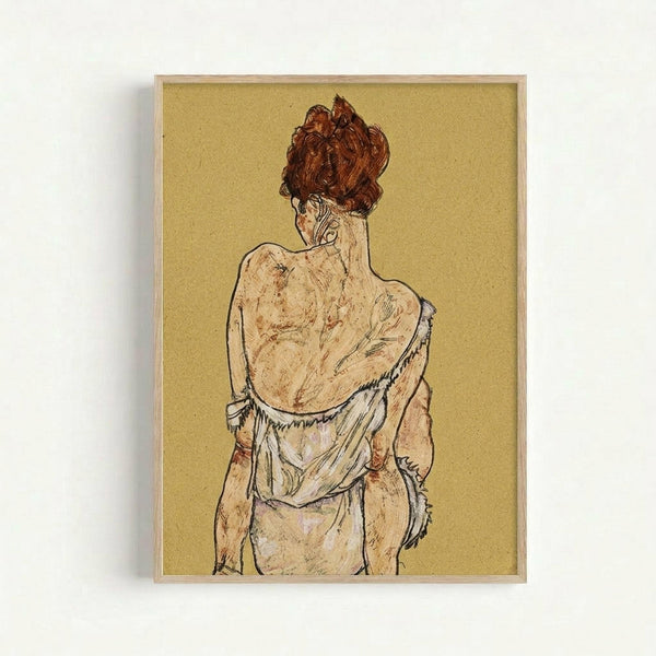 Framed reproduction of an early 20th century expressionist drawing showing a figure from behind with auburn hair in an updo, wearing a white garment that drapes off the shoulders. The artwork features bold black outlines and earthy tones against a golden yellow background, displayed in a simple light wood frame against a white wall.
