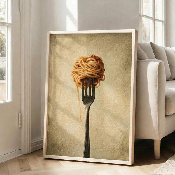 May include: Framed vintage-style artwork showing golden spaghetti noodles twirled on a dark fork against a textured beige background, displayed in a bright living room with white walls, large windows, and a beige sectional sofa on hardwood floors