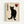 Black cat silhouette sitting upright with bright yellow eyes on aged cream paper background, featuring vertical Japanese kanji characters on the left side and a red heart symbol with black kanji in the upper right corner, displayed in a light wood frame against a white wall