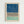 May include: Framed abstract art print hanging on white wall featuring three horizontal sections - textured blue watercolor wash at top, black hand-drawn herringbone pattern in middle, and soft sage green watercolor block at bottom, all on cream paper in light wood frame