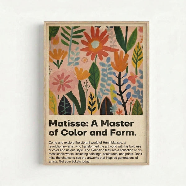 Framed poster featuring vibrant botanical illustration with stylized flowers and leaves in orange, pink, green, and blue colors on cream background. Bold black text below reads "Matisse: A Master of Color and Form" followed by exhibition description. Light wood frame against white wall in gallery-style presentation.