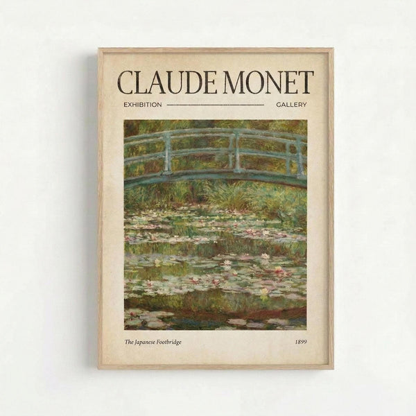 A framed exhibition poster featuring Claude Monet's impressionist painting of a Japanese footbridge arching over a lily pond. The artwork shows soft brushstrokes in greens, blues, and pinks depicting water lilies floating on the pond's surface beneath the pale blue bridge. The cream-colored poster includes "CLAUDE MONET" at the top, "EXHIBITION GALLERY" as a header, and "The Japanese Footbridge 1899" at the bottom. The print is displayed in a light wood frame against a