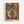 Abstract cubist-style artwork depicting fragmented human faces with geometric shapes in vibrant blues, oranges, yellows, and reds. Multiple eyes, lips, and facial features are deconstructed and reassembled in overlapping angular forms. The piece is displayed in a light wooden frame against a white wall, with "PICASSO" and French text printed at the bottom of the poster.