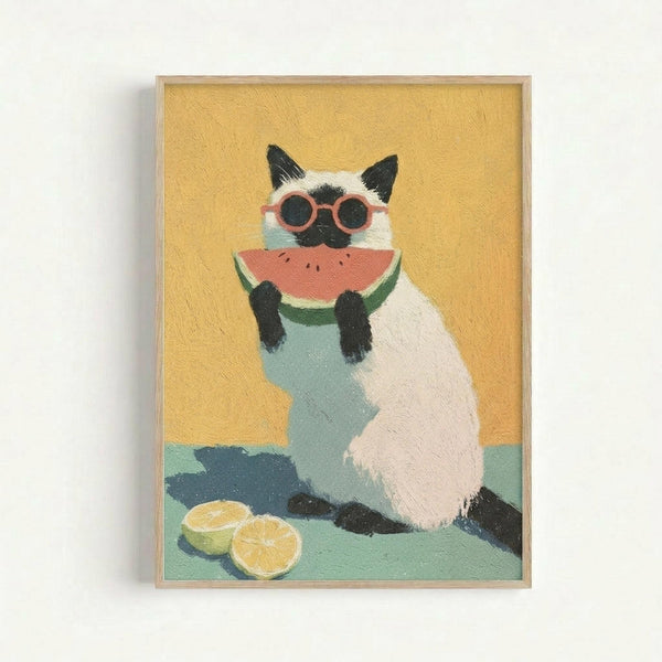 Framed painting of a Siamese cat with dark ears, face, and paws wearing coral-pink round sunglasses and holding a watermelon slice. The cat sits against a yellow background with lemon slices nearby on a mint green surface. The artwork has visible brushstroke texture and is displayed in a light wood frame against a white wall.