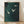 May include: Framed artwork showing three white birds in flight against a dark teal-green textured background with brushstroke effects, displayed in a light wood frame leaning against a white wall on wooden flooring with natural lighting creating soft shadows