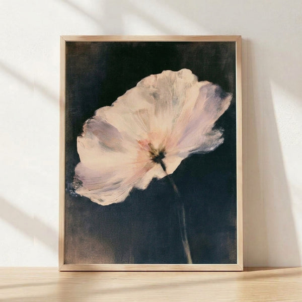 Soft watercolor poppy painting in cream, pink, and lavender tones with charcoal shadows, framed as wall art in an impressionist style.