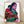 Pop art poster featuring a Native American mother and child in vibrant, contrasting colors characteristic of Warhol's iconic style, framed on a wall.