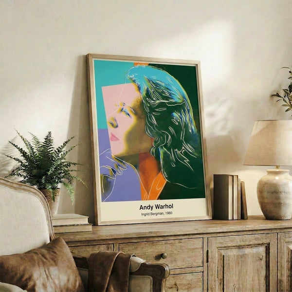 Warhol-inspired celebrity portrait of Ingrid Bergman with vibrant magenta and cyan background, graphic pop art style framed poster.