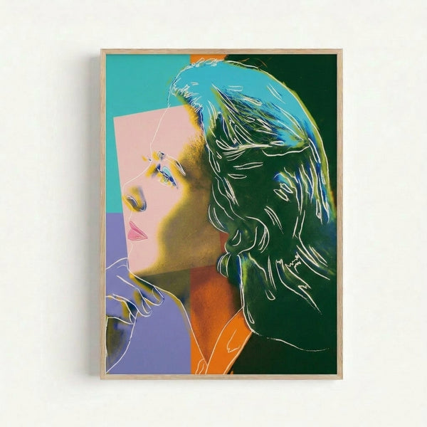 Framed pop art print featuring Ingrid Bergman's face in bright, saturated hues with repeated color blocking characteristic of 1960s Warhol compositions.