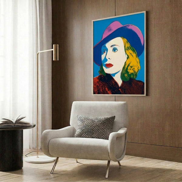 Vibrant pop art wall poster featuring Ingrid Bergman in a hat, using bold color combinations and the signature Warhol printmaking technique.