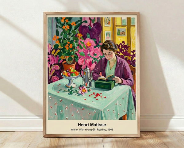 Matisse-inspired framed poster of a young girl absorbed in reading at a table in a bright, colorful interior with blue, red, and green hues creating an intimate, contemplative domestic scene.