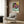 Framed print in modern Impressionist style showing a focused young reader in a carefully composed room featuring bold geometric color fields of white, green, red, and blue.