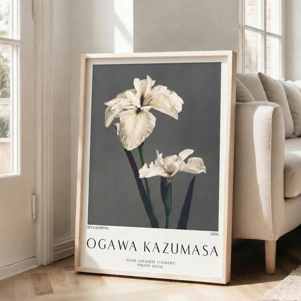 Japandi botanical art print depicting an iris flower in restrained grays and dark greens with pale yellow details, presenting quiet elegance in a minimalist composition.