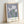 Minimalist framed iris Kaempferi artwork with soft naturalistic rendering in whites, grays, and muted greens against a cream field.