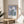 Serene iris Kaempferi poster in soft grays and greens, minimalist composition with naturalistic detail characteristic of Japandi style.