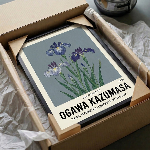 Minimalist framed artwork of lavender iris with stem and leaves rendered in muted tones, embodying wabi sabi principles of botanical beauty.