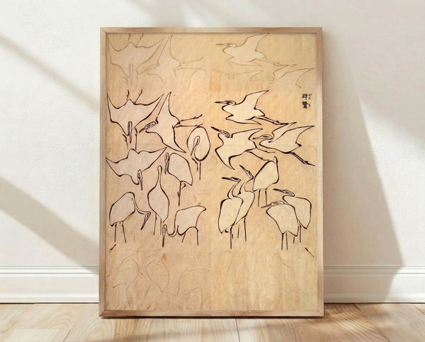 Japanese ink drawing of a crane in scholarly style, rendered with fine brown lines on aged cream paper, framed as a print on a wall.