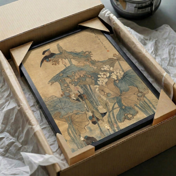 Japanese woodblock-inspired wall print showing tranquil bird and lotus composition with soft charcoal, cream, and sage green tones.