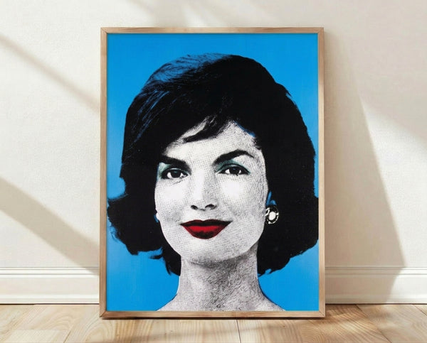 Pop art portrait poster featuring a stylized face in vibrant contrasting colors, characteristic of 1960s screen print technique displayed as framed wall art.